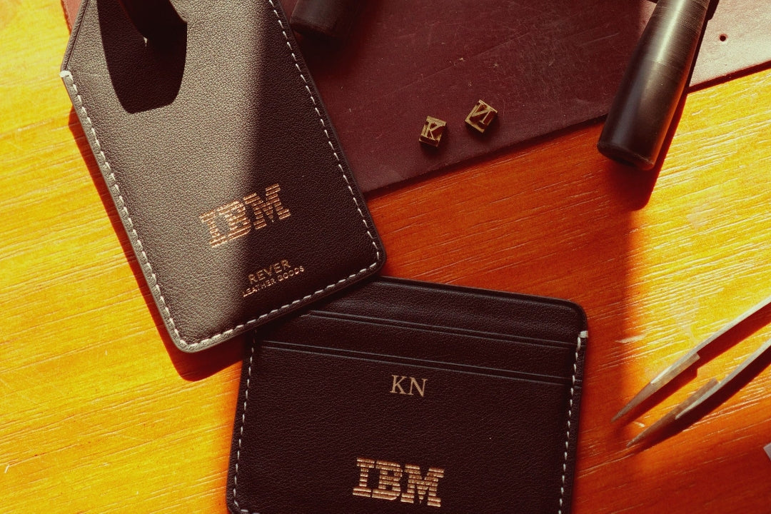 close up shot of a bag tag and wallet as personalised corporate gifts from client