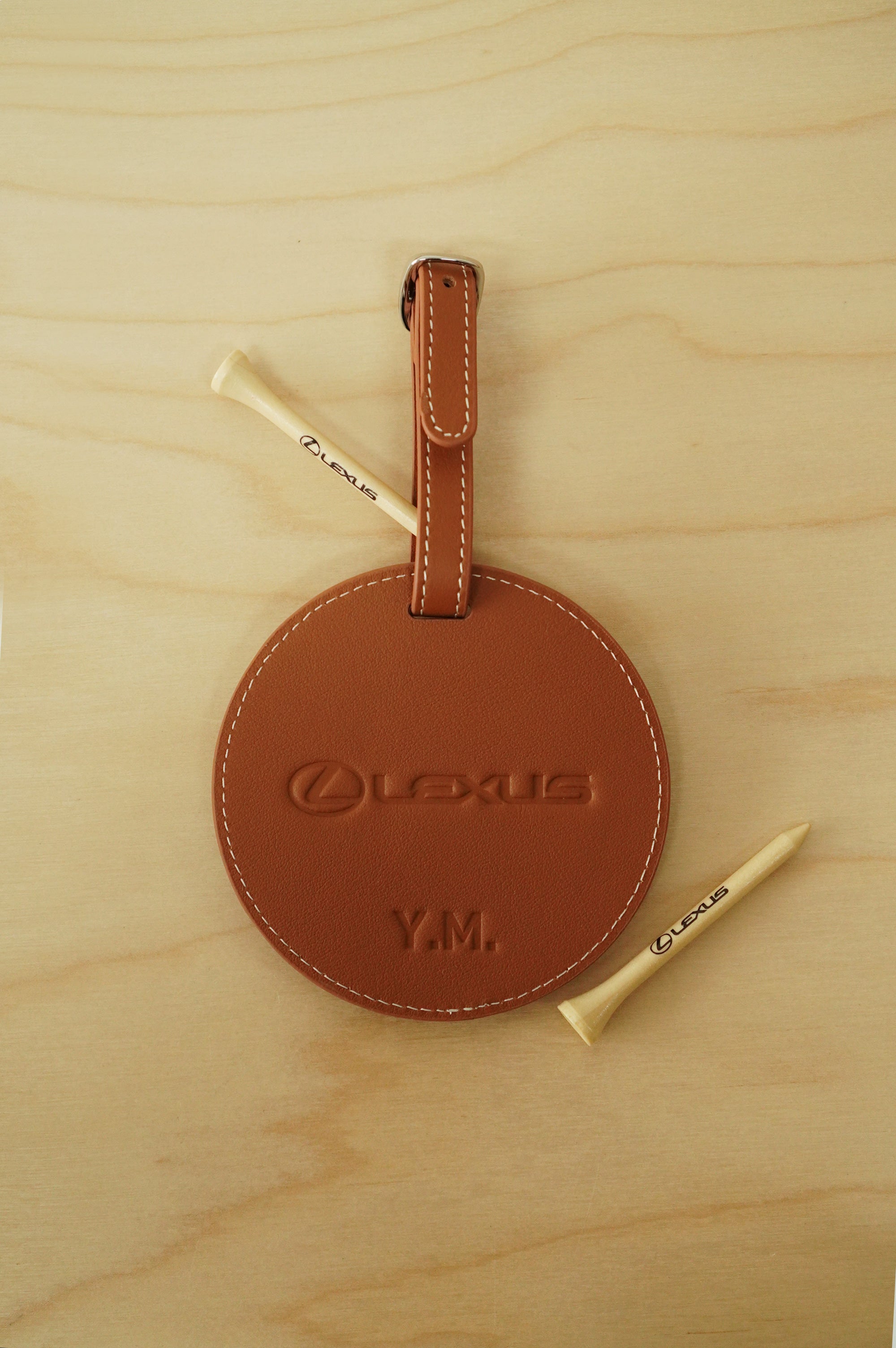 Event logo printed golf tees included with premium corporate gifts Singapore