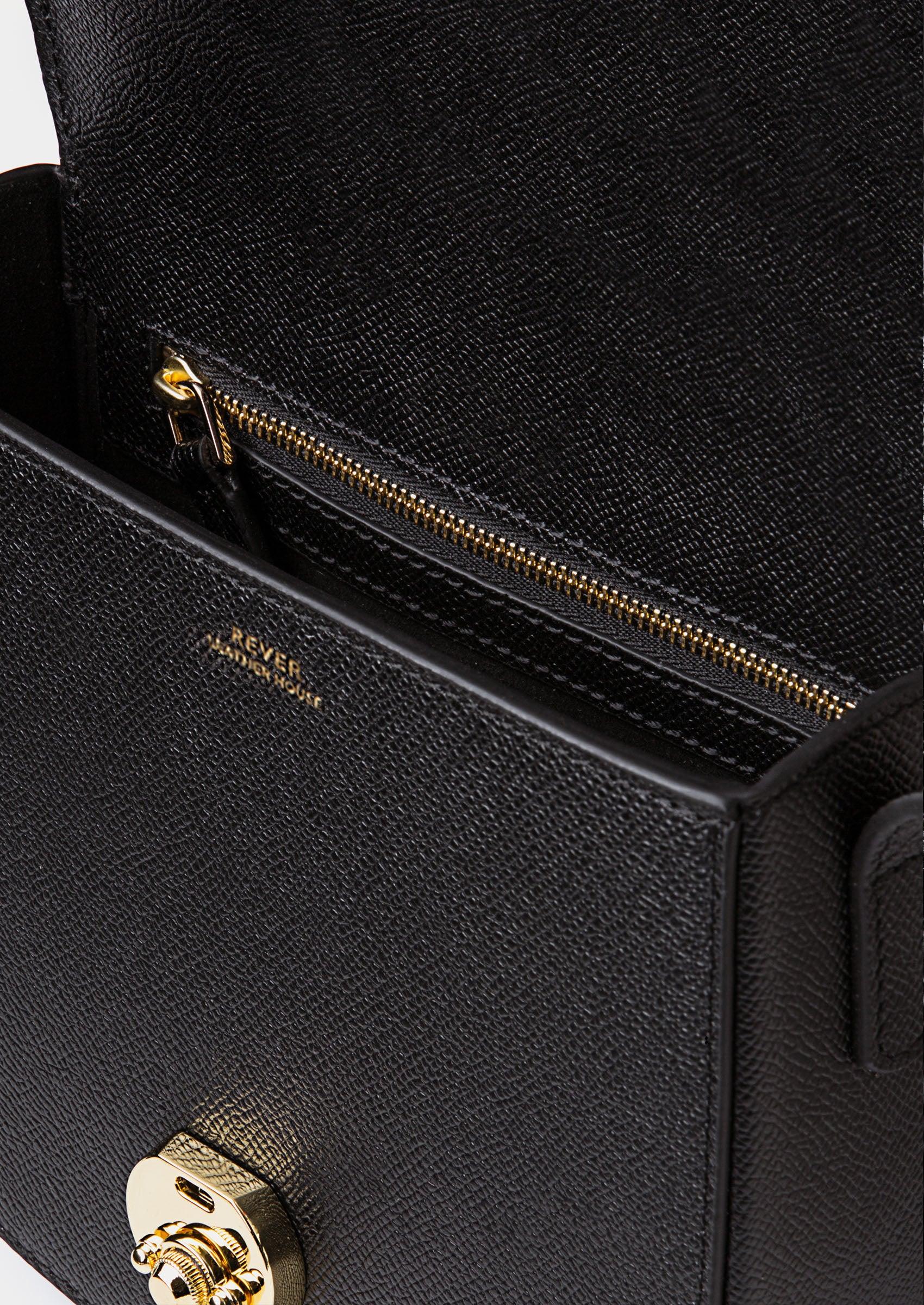 Huns Saddle Bag open to reveal internal compartments and zip pocket.