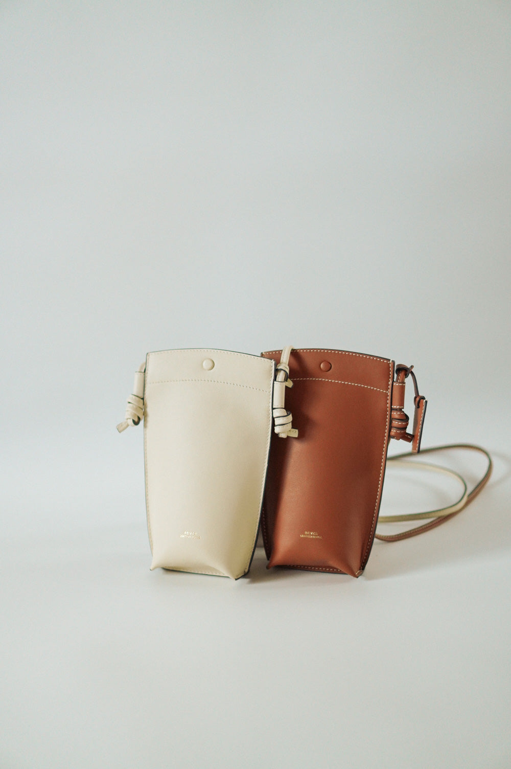 Rubin Phone Sling Bag Duo Set in Maple and Milk, personalised leather crossbody bags in Singapore, ideal for carrying phone, cards, and small essentials.