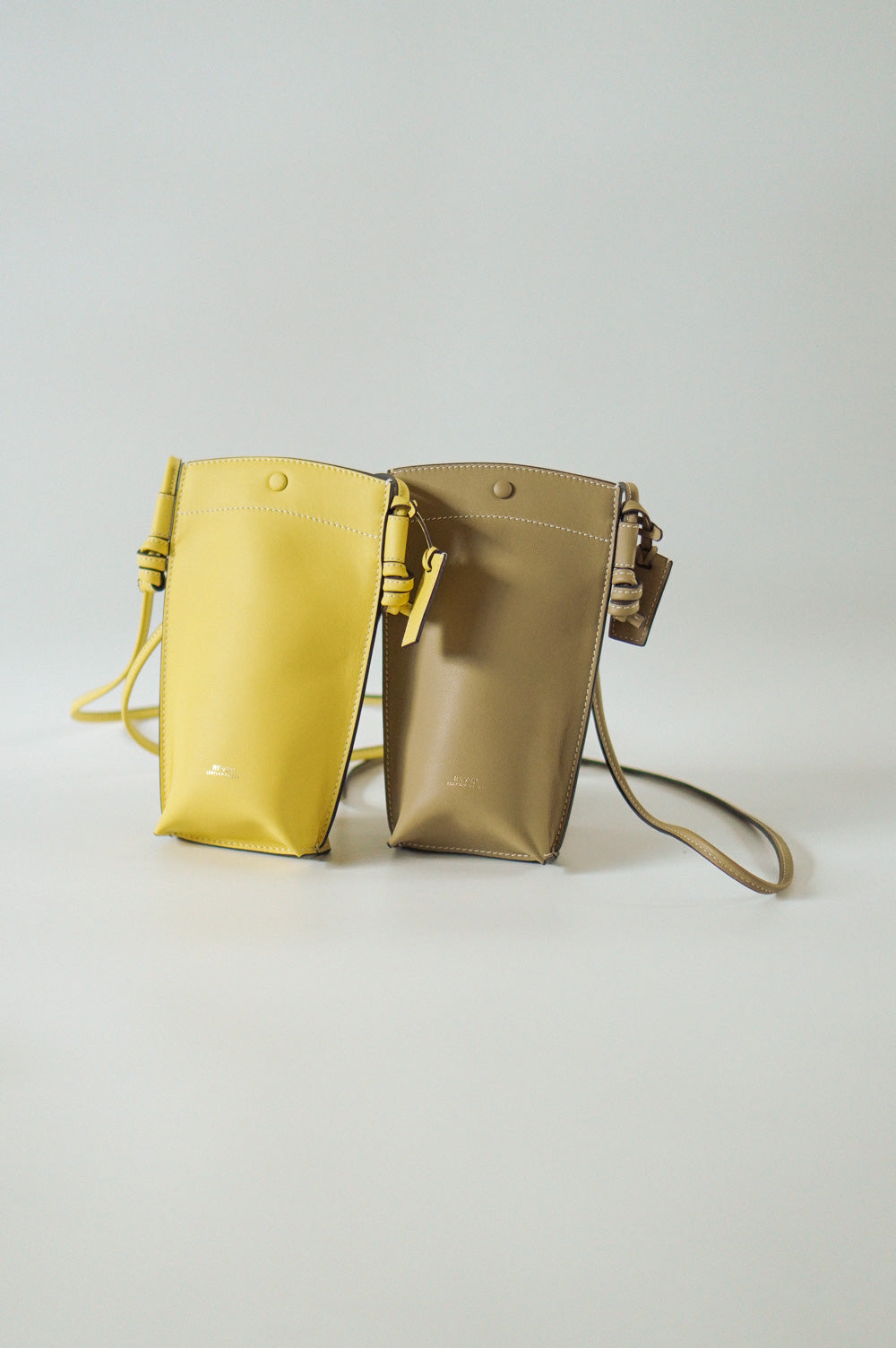 Rubin Phone Sling Bag Duo Set in Biscuit and Lemon, personalised gifts Singapore, customised crossbody bag, leather phone bag for women, ideal for carrying cards, cash, and small essentials.