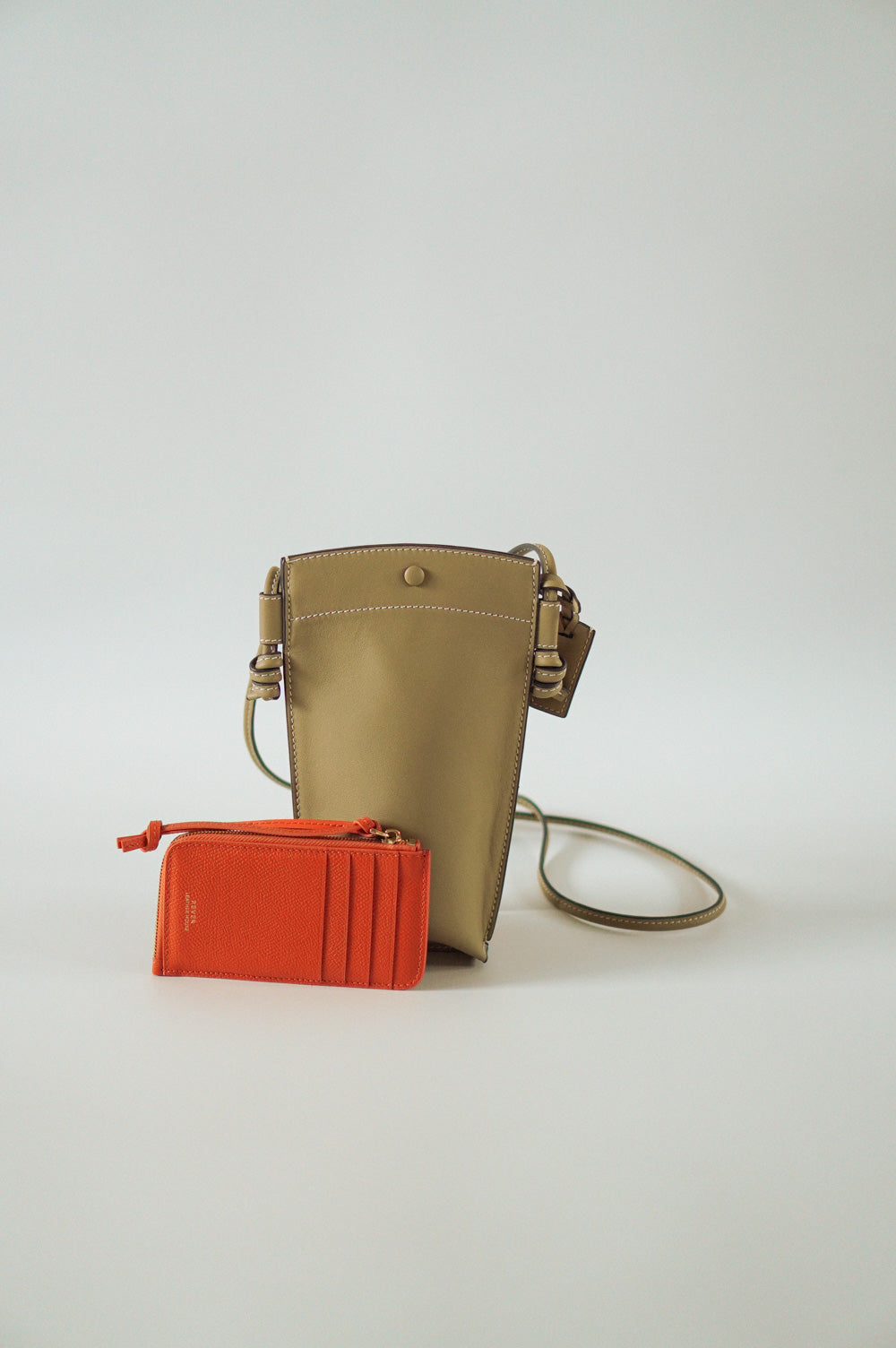 Rubin Phone Bag in Biscuit & Eloise Zip Wallet in Orange Customised Gifts Singapore