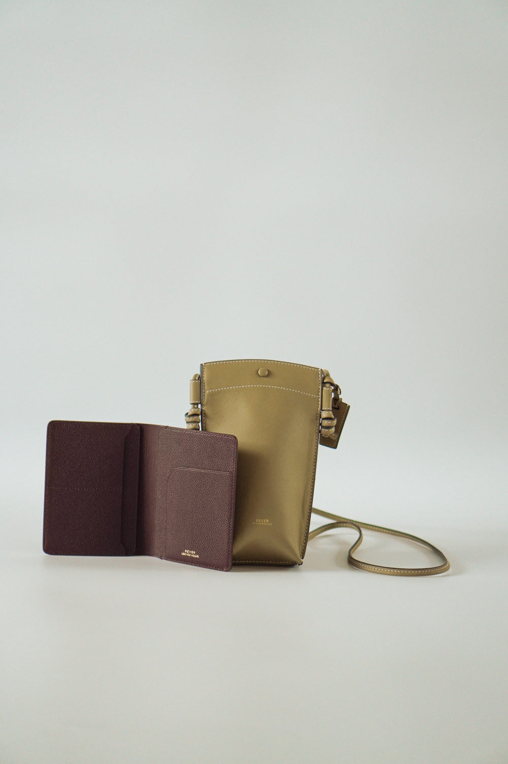 Rubin Phone Bag in Biscuit & Henry Passport Holder in Burgundy Personalised Gifts Singapore