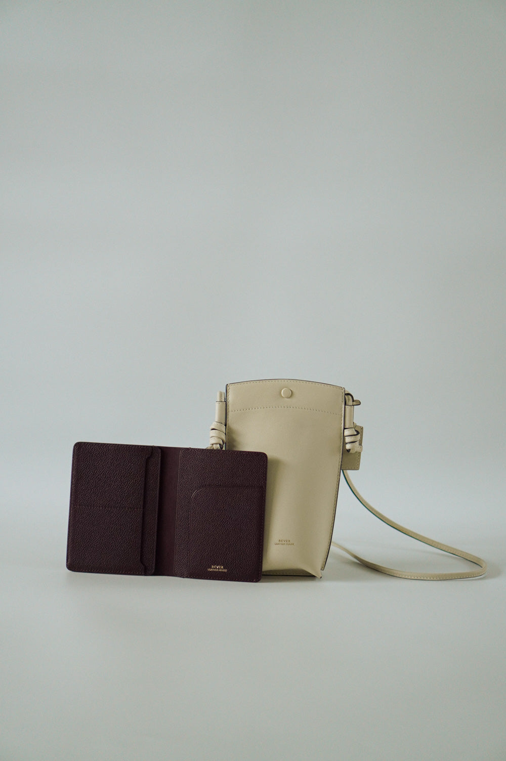 Rubin Phone Bag in Milk & Henry Passport Holder in Burgundy Customised Gifts Singapore