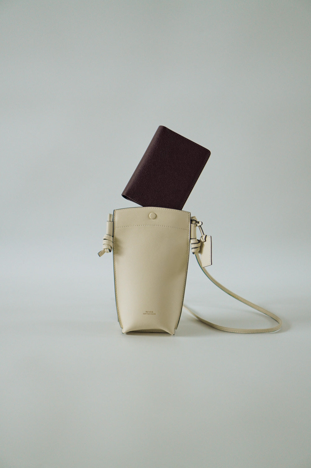 Rubin Phone Bag in Milk & Henry Passport Holder in Burgundy Personalised Gifts Singapore