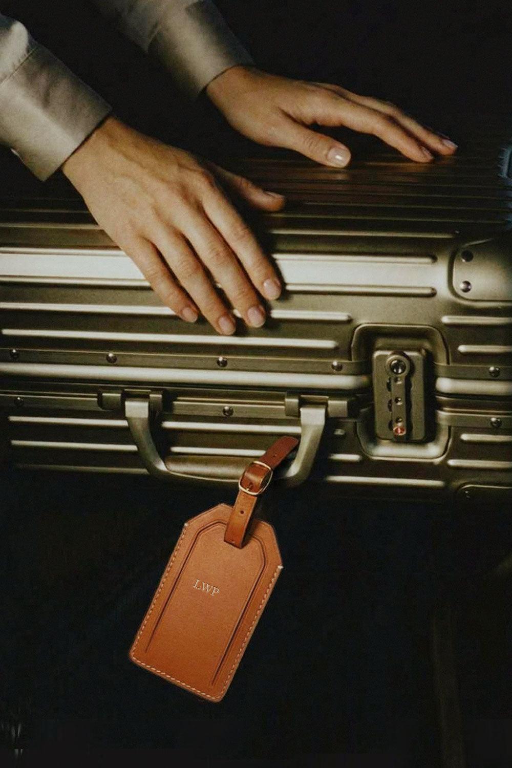 Plath Luggage Tag in Maple on luggage