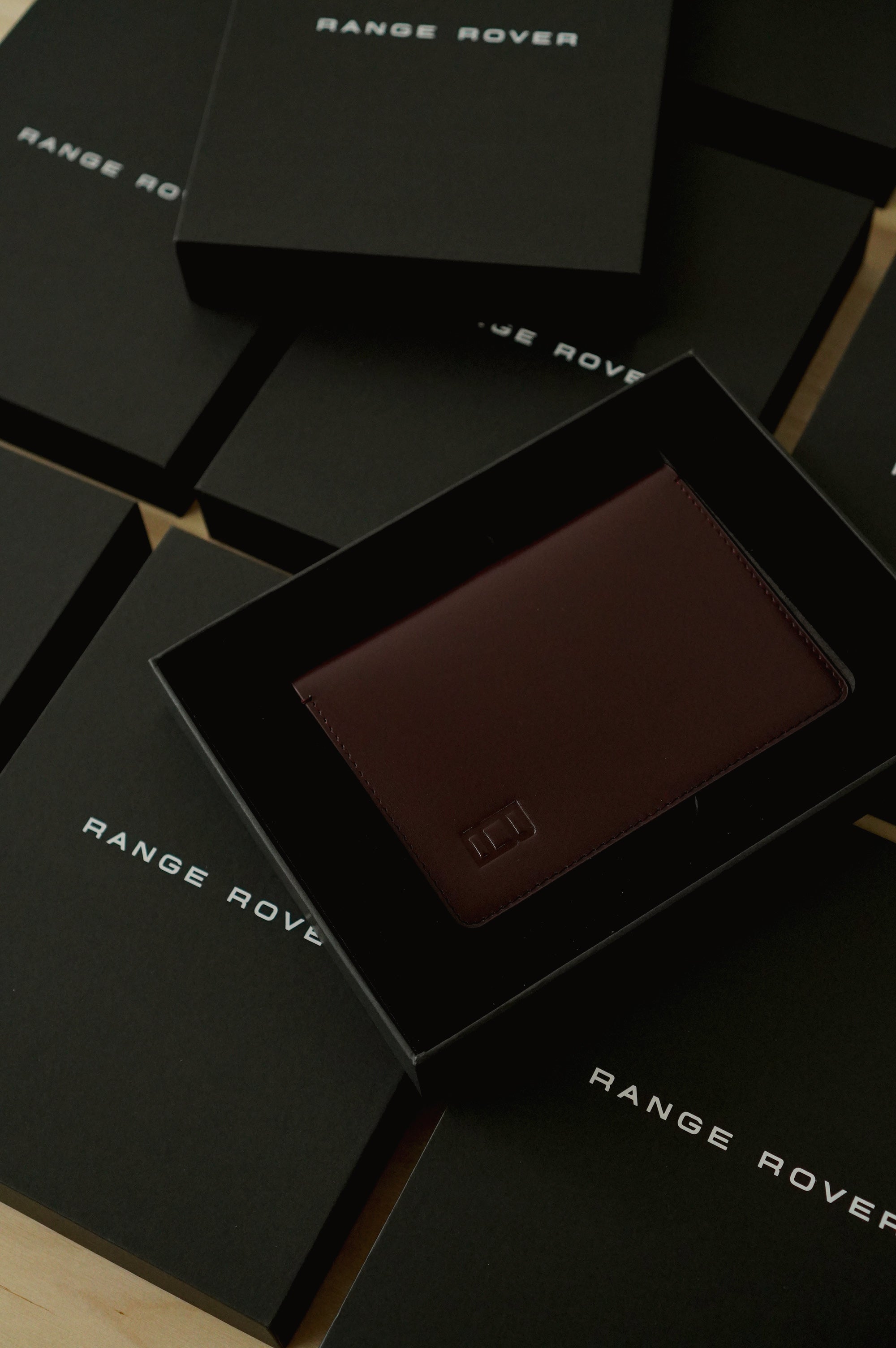 Luxury leather passport holder in box calf leather with subtle branding