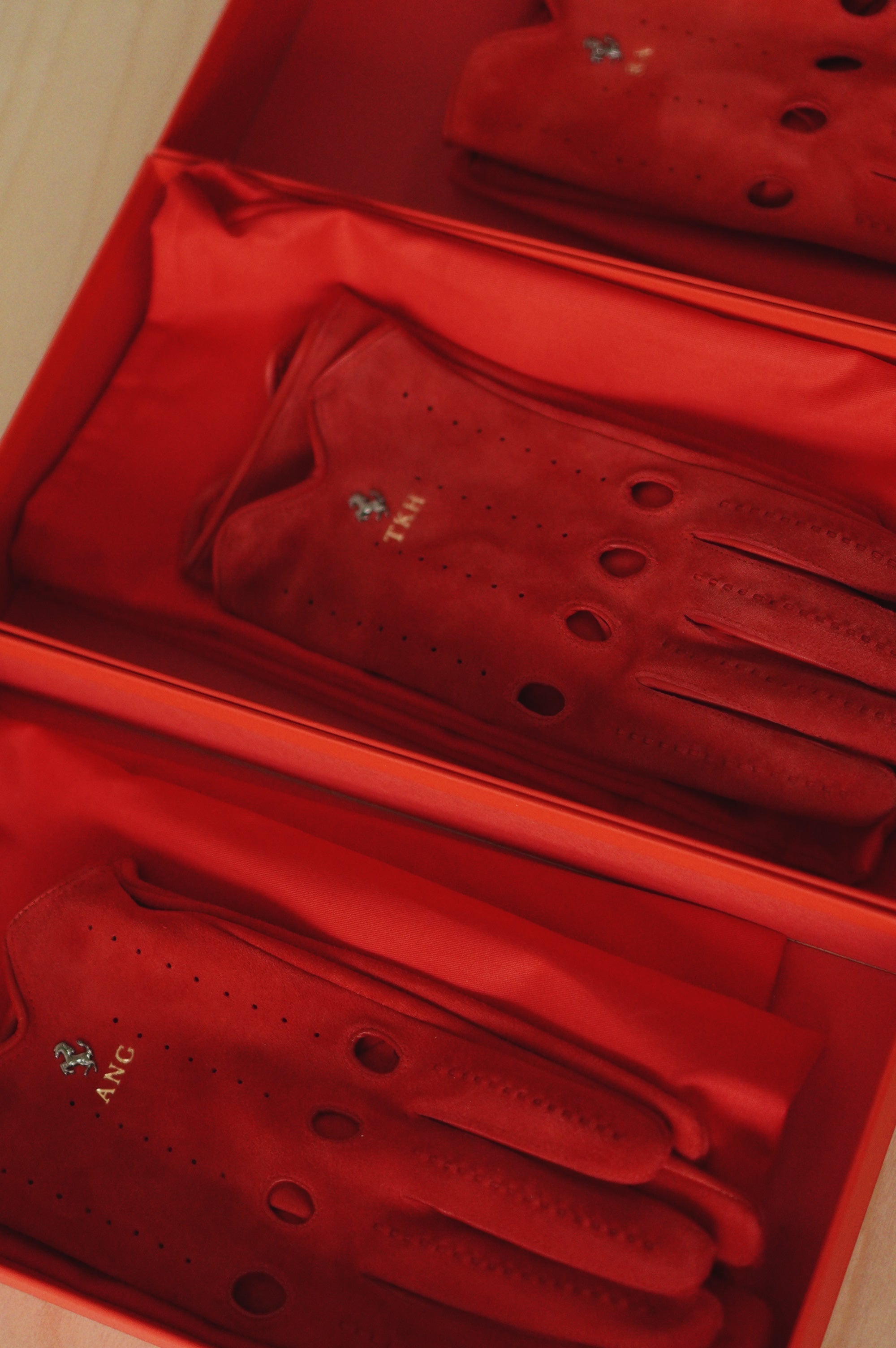 Luxury corporate gifts Singapore: Ferrari gloves with initials embossed