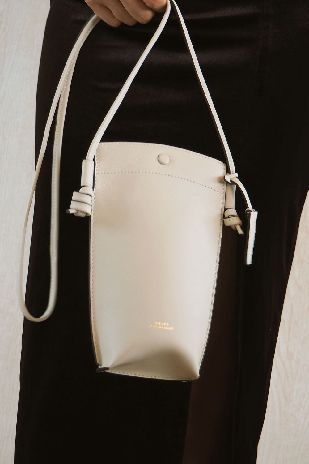 Rubin Crossbody Phone Bag in Milk, leather mini bag in Singapore, ideal for carrying phone, cards, and small essentials.